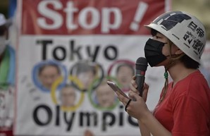 Японцы вышли на пикет против Олимпиады (Видео)